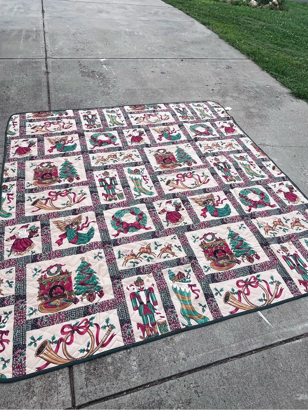 Holiday Patchwork Quilt with Green and Red Christmas Motifs